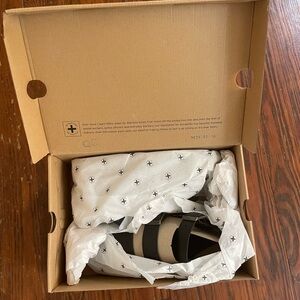 Dr. Martens Black and Tan Sandals